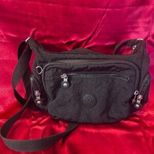 Kipling Tarry Convertible Sling Waist Pack both a waist pack and a sling bag BLK